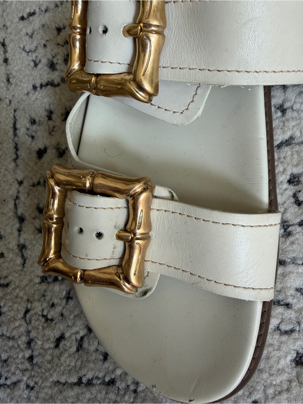 Women’s Schutz Enola White Slide Sandals with Decorative Gold Buckles - Picture 4 of 5